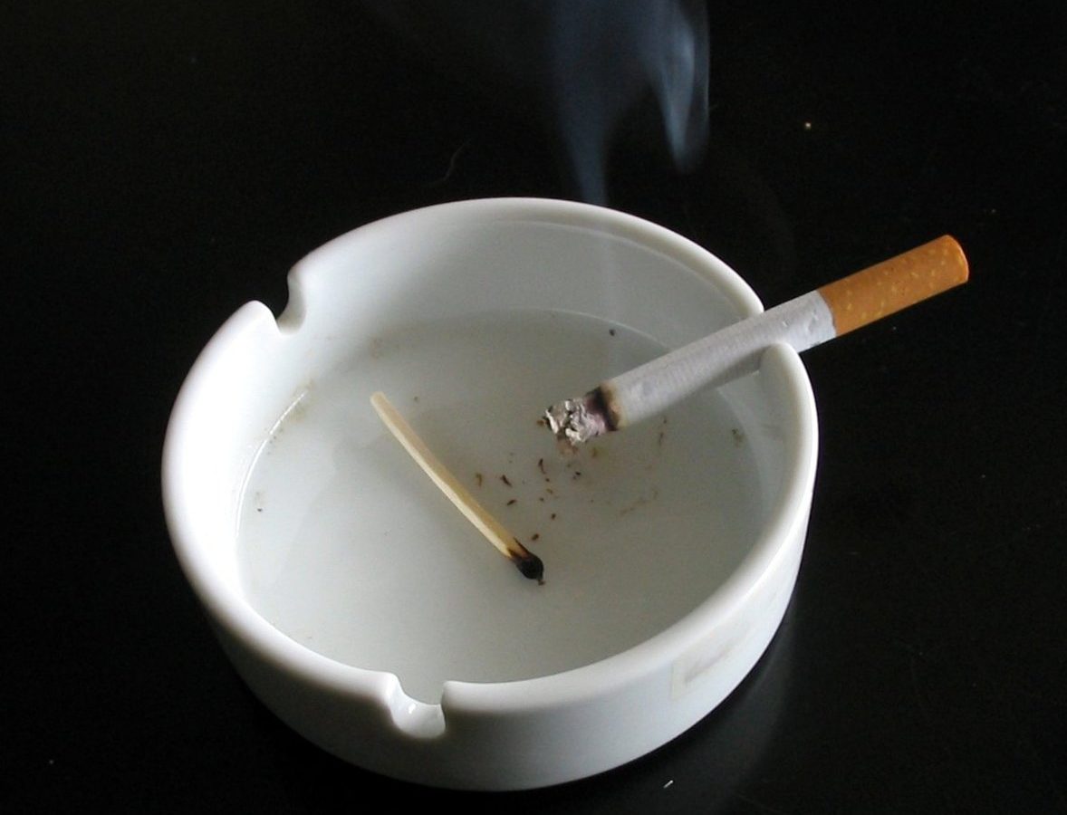 White ashtray with cigarette — best smokeless ashtrays guide