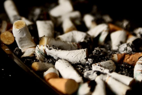 Stubbed-out cigarettes in an ashtray — how to quit smoking guide