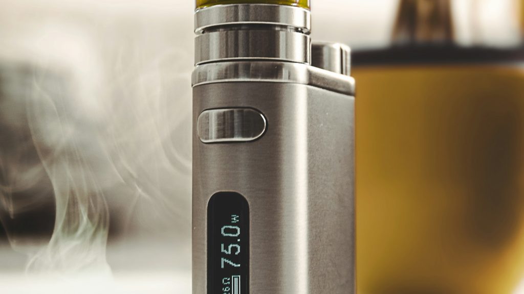 Close-up of a compact box-mod vaporizer